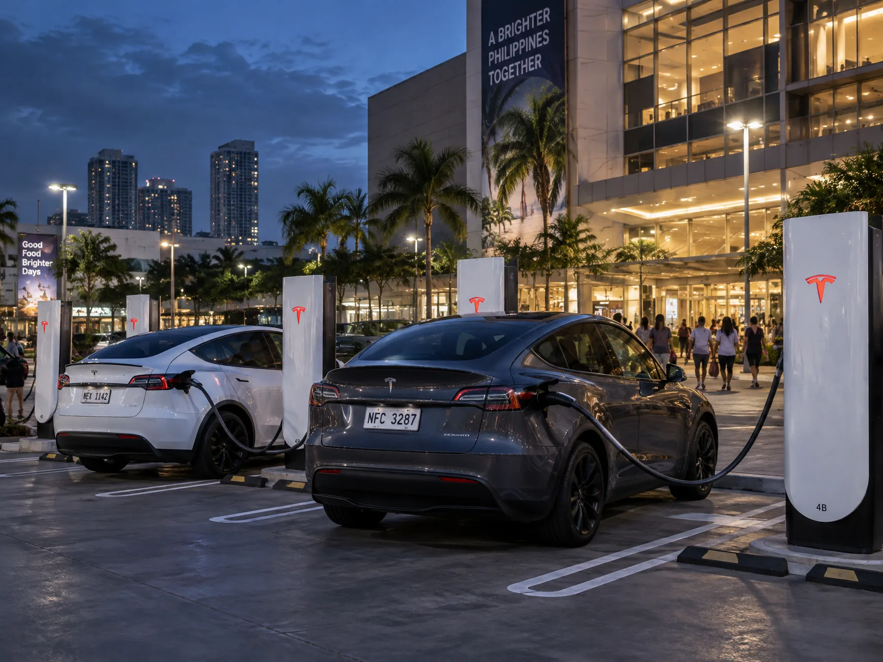 Row of white Tesla V4 Supercharger stalls in a mall basement parking area with a Model Y L plugged in