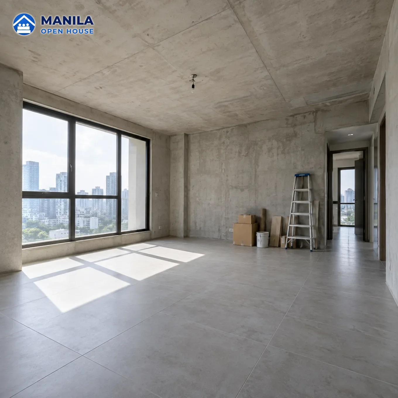 An empty condo living room with plain walls and morning light, before any staging